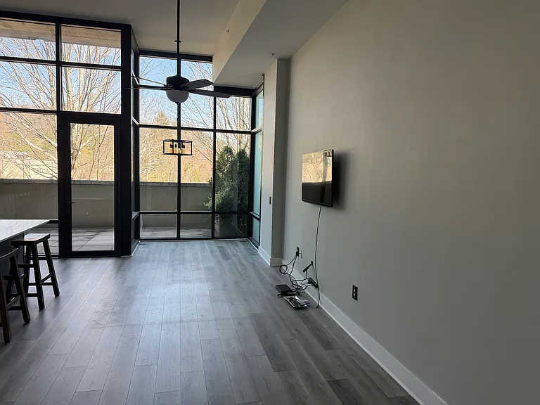 Living room. TV with access to streaming services/cable provided.
