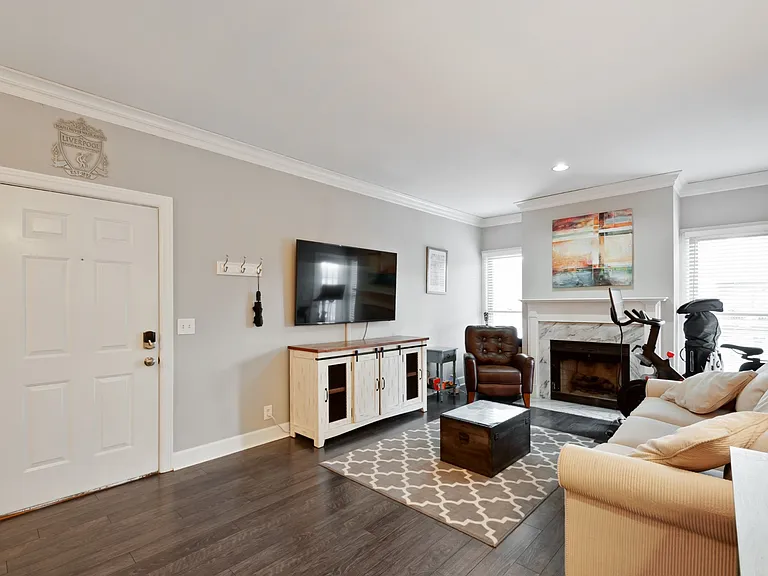 Rare top-floor, third-floor unit with no neighbors above, offering added privacy, reduced noise, and a peaceful living experience. Spacious living room features an open layout that flows seamlessly into the dining area.