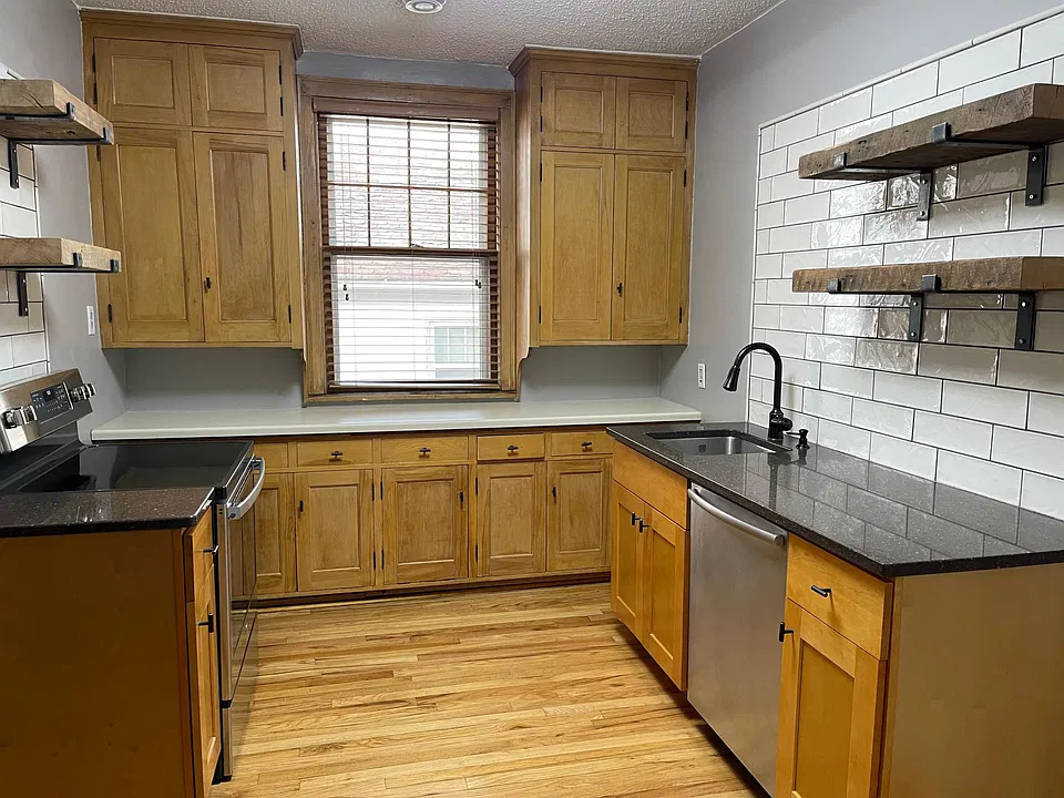 Updated kitchen featuring quartz countertops