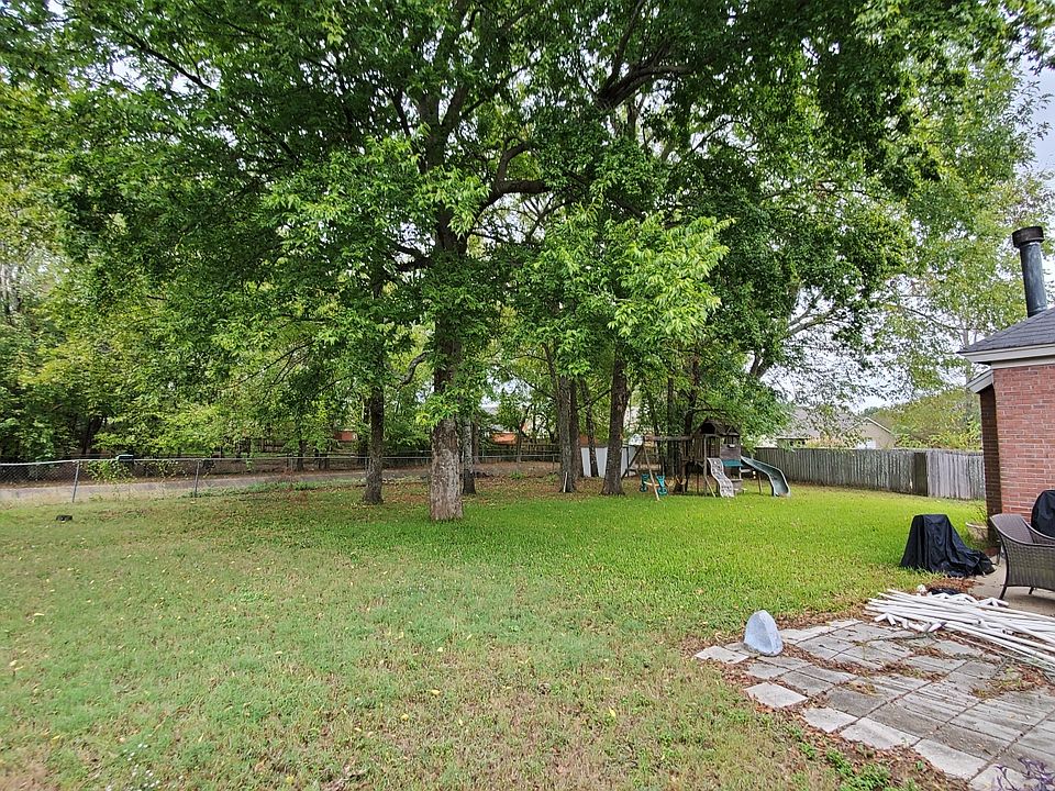 Large backyard with storage shed