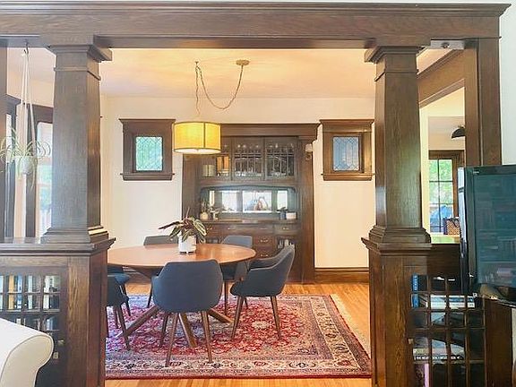 Dining room with original built-ins. Fits 6-8 person dining table.
