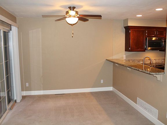 Dining area with sliding door onto private patio