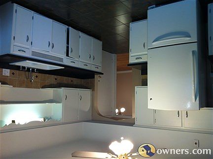Kitchen with newer appliances and tile