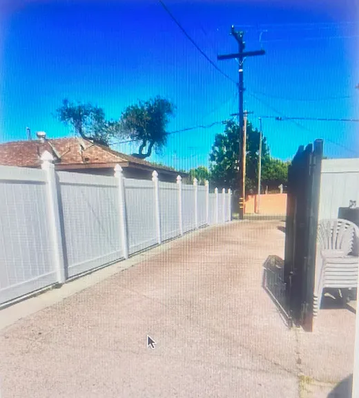 Private drive-way leading to back patio parking for 2 cars outside the garage. EV charging station available for additional fee.