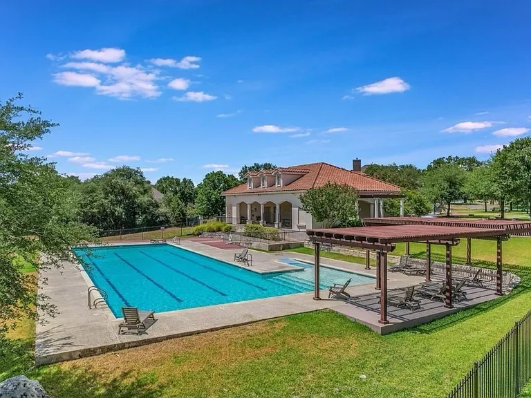 community pool just 2 doors down with a pavilion to host parties and gatherings