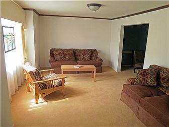 Formal Living Room w/Crown Molding & Light