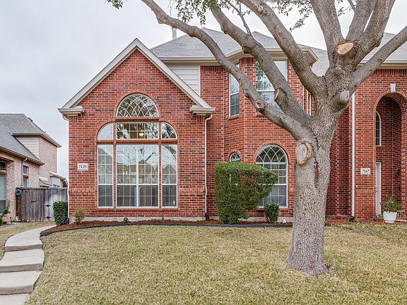 Completely remodeled duplex home, 2033 sq ft. Beautiful large windows make for light, bright living spaces.