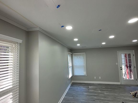 Living room - just redesigned. Note the lighting! (we are still finalizing the repairs, sorry!)