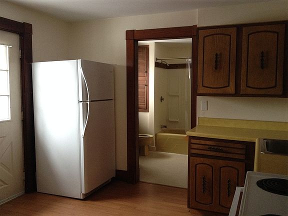 Kitchen with View of Bathroom
