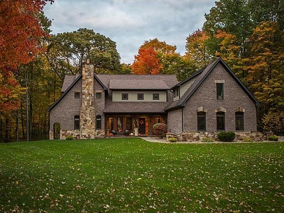 Welcome home to quality craftsmanship at 206 White Oak Drive nestled in the woods of Poplar Forest o