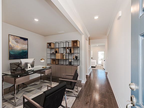 Flex space off of the foyer makes a great home office or formal dining room.