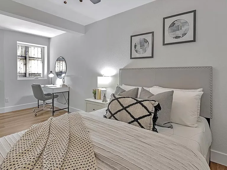 First bedroom with a work area.