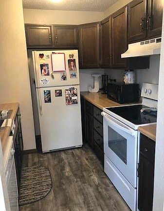 kitchen (newer flooring, stove)