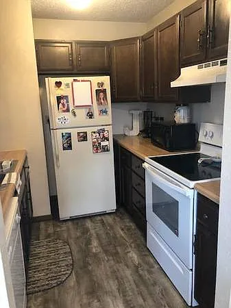 kitchen (newer flooring, stove)