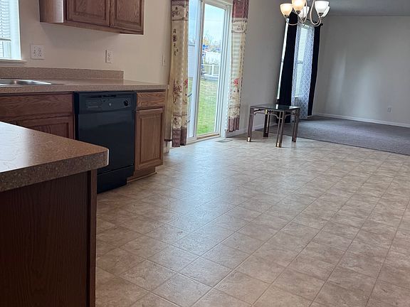 Spacious kitchen with all appliances including dishwasher