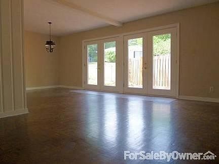 Den and Dining area with parquet floors
						:
						2 French doors to second patio with privacy fence, floors sanded and refinished