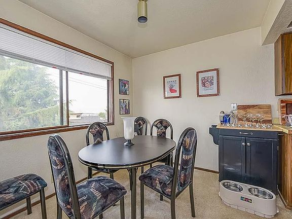 Dining Area that fits full size dining table . Great natural light.