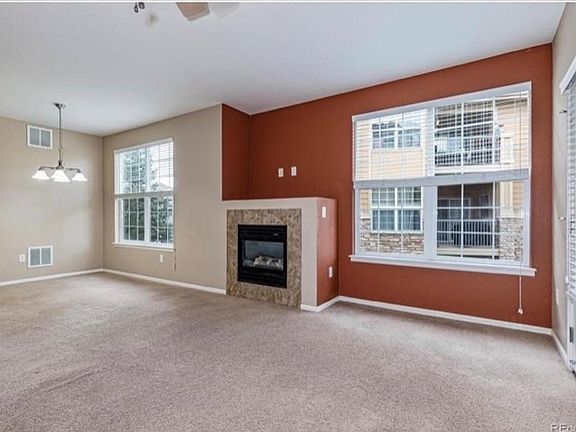 Living room, fireplace and dining room