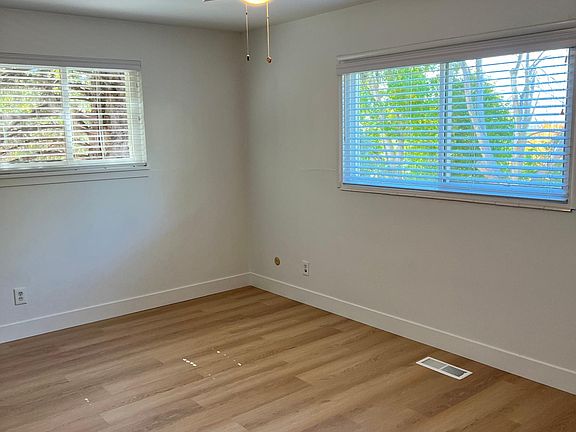 Master bedroom has en suite, new ceiling fan, new floor, baseboards and paint, new window sills and blinds.