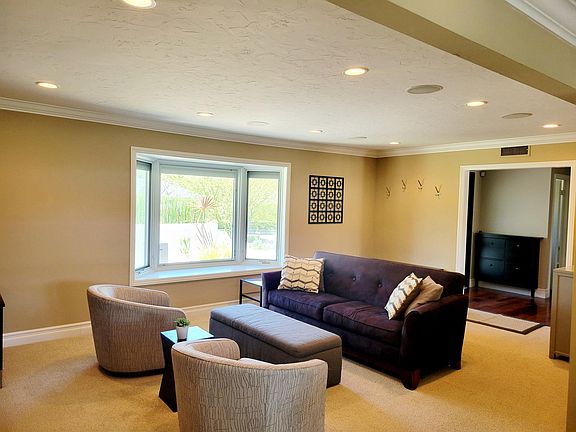 Living room with entry in background