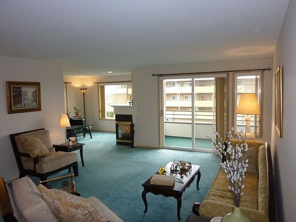 Incredibly spacious unit with over 1,600 sq. feet, the living/dining room offers windowed view of the world. Large sliding glass doors leads to deck with gas BBQ attachment, informal eating area or family room offers gas corner fireplace.