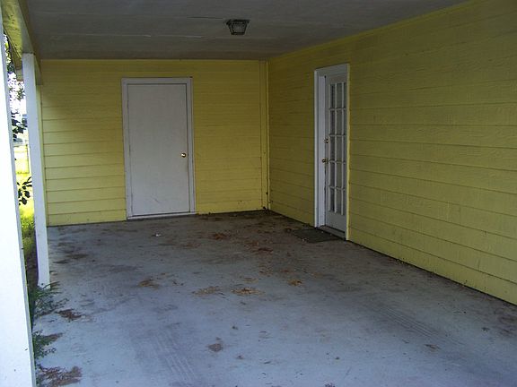 Attached Carport and Storage