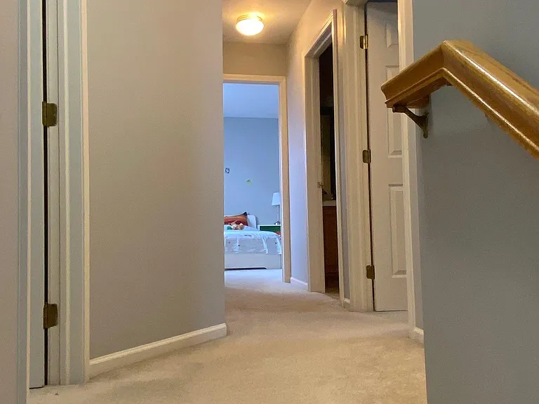 Stairs lead to 3 bedrooms, Master Suite and two large size rooms. Large shared full bathroom for two bedrooms.