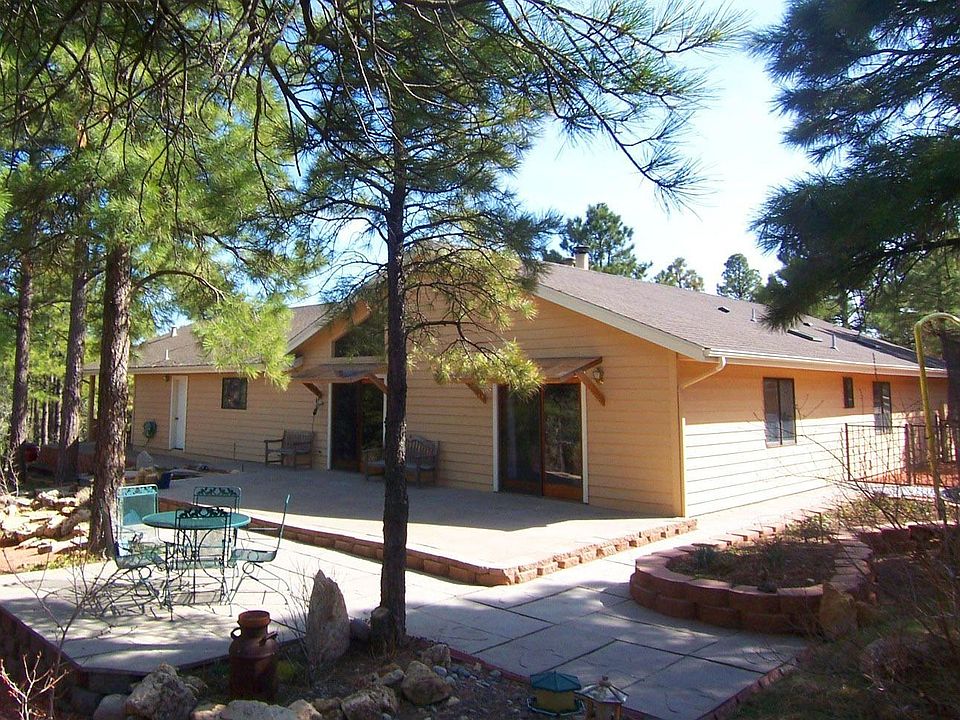 Back of house and peaceful forest-like setting!