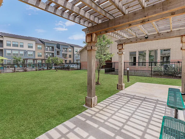 Our pet-friendly dog park at Cityscape Apartments in Houston offers a safe, fun space for your furry friends to run and play.