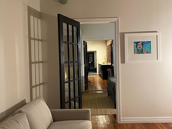 This is the view from the living room through the rest of the house. The style of house is Shot-gun, which is typical in the southern United States.