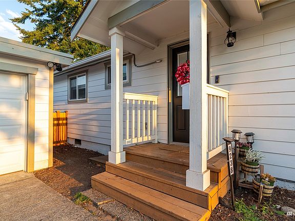 Convenient covered entry off garage. >