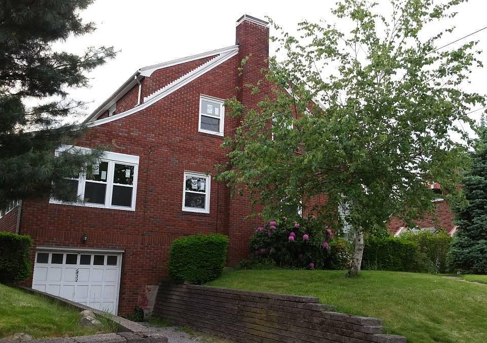 Street view with attached garage