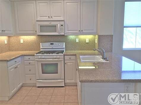 Lot's of granite counter space and bar seating.