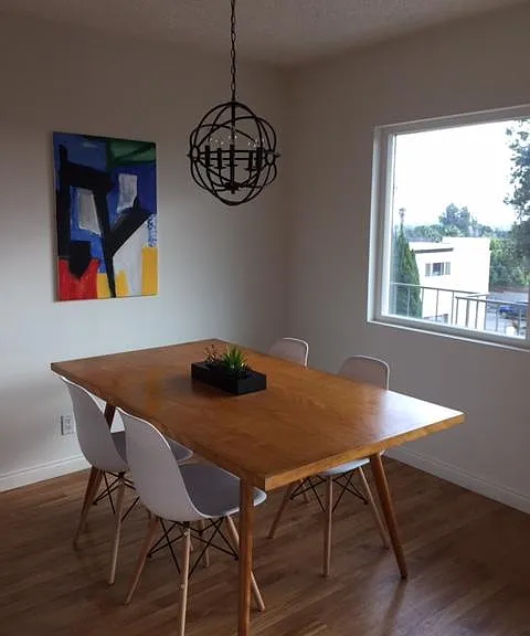 Awesome sunset views and daytime light and views to the Marina Towers. Dining area off kitchen