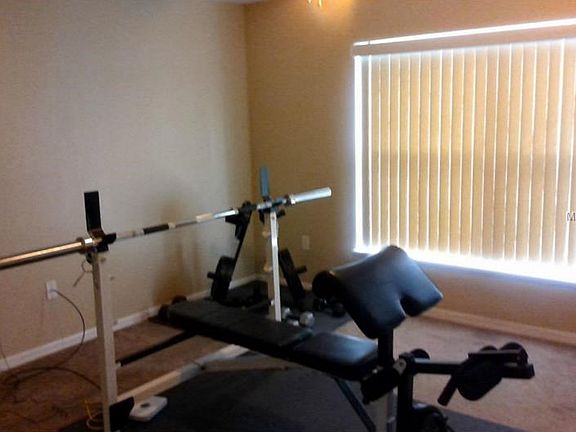 Living room currently used as gym
