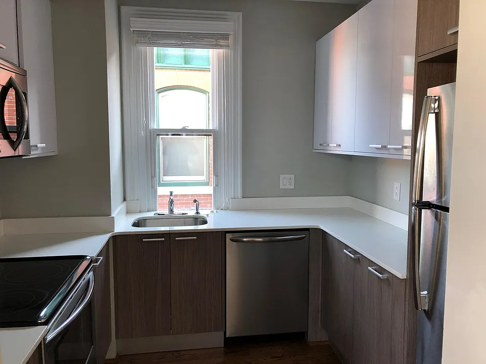 Lots of Cabinets and modern finishes.