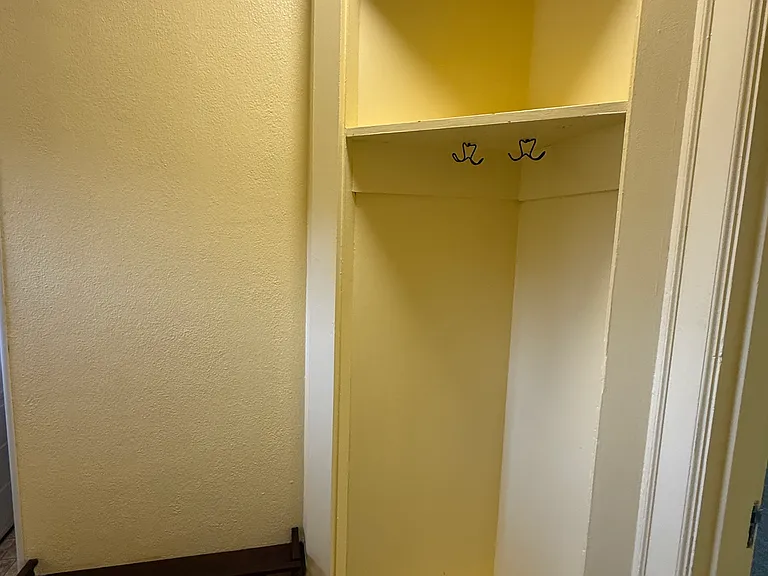 Hallway coat closet and shoe rack