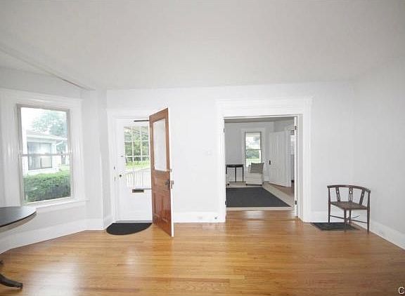 Spacious rooms with gleaming hard wood floors!