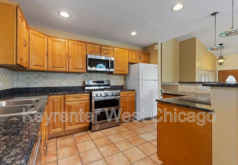 1003 S Finley Rd — Photo 7