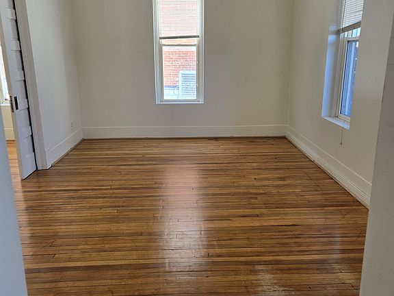 Living room. Could possibly be 3rd bedroom. There are pocket doors for privacy.