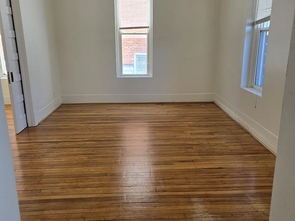 Living room. Could possibly be 3rd bedroom. There are pocket doors for privacy.