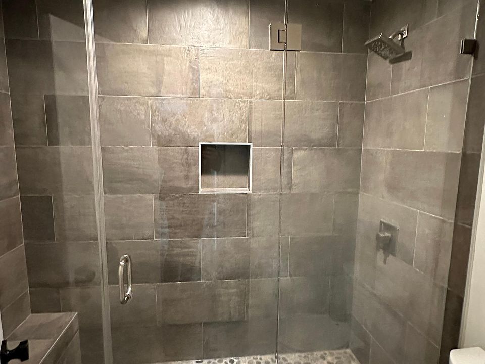 Remodeled bathroom with large four person shower