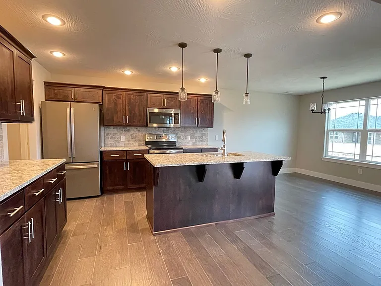6002 S Iris Ln — Photo 3