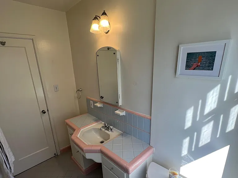 Bathroom with impeccable 1940's tile