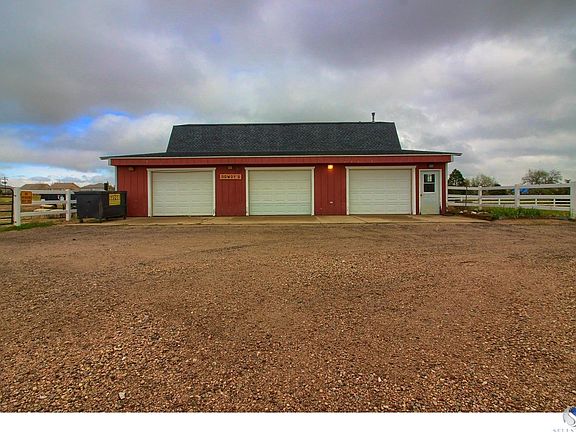 4 extra garage bays! 3 shown in this photo.