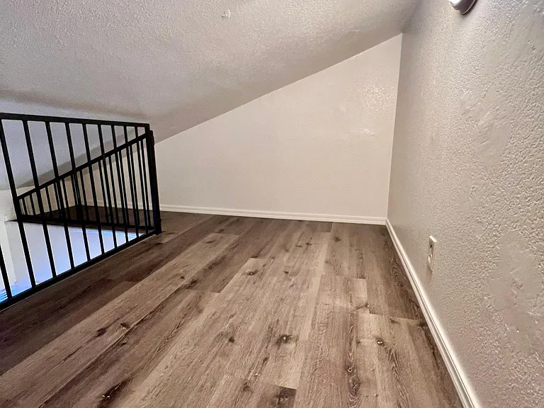 New upstairs loft of bedroom 1, new flooring, light fixture, paint
Put your mattress here and have bedroom below as study and living area
Also great storage space