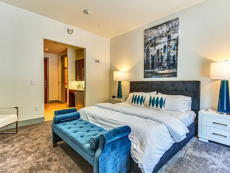 Spacious bedroom with luxury finishes