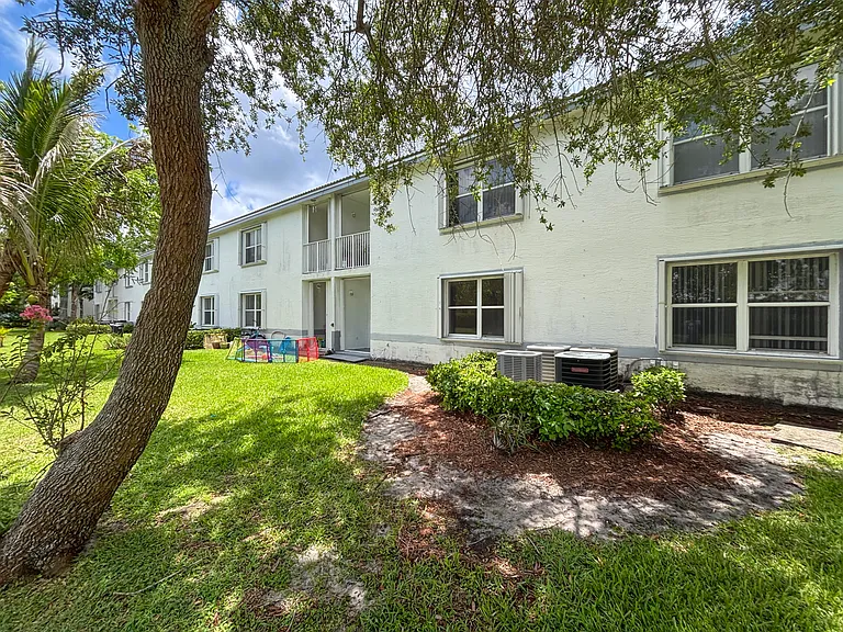 9013 NW 38th Dr #106 — Photo 14