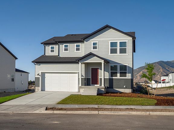 The Cottonwood floorplan exterior image taken at a Meritage Homes Community in Tooele, UT.