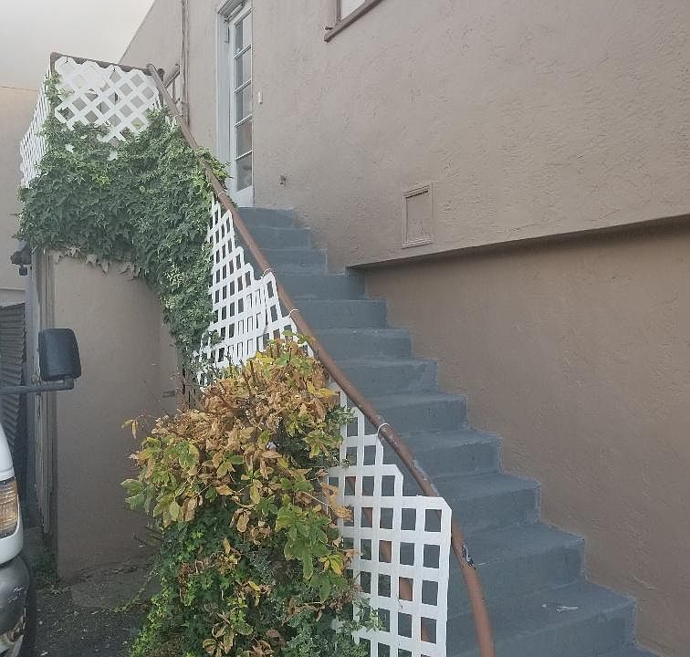 Entrance to upstairs apartment in back of Business
